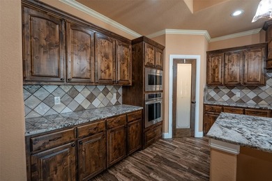 Welcome home to this charming retreat tucked into an established - photo 7
