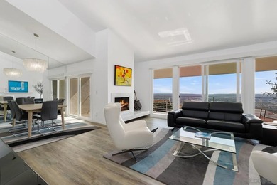 Tucked into the gated enclave of Del Cerro Heights, this fully - photo 1