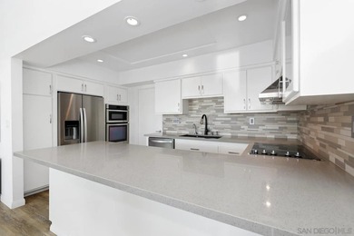 Tucked into the gated enclave of Del Cerro Heights, this fully - photo 9