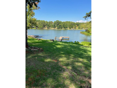 Rare find on Swan Lake!  This waterfront property has 3 bedrooms - Lake Home For Sale in Tyler, Texas