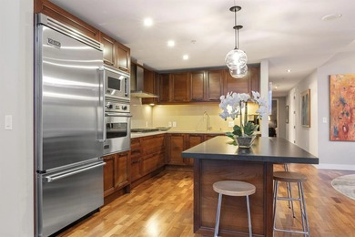 Perched high on the 27th floor, this rare end unit residence at - photo 11