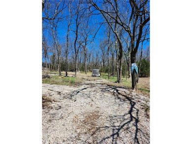 You will love this building lot with peek-a-poo views of the - photo 1