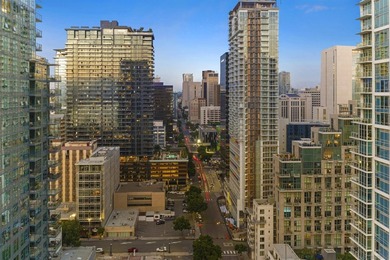 Perched high on the 27th floor, this rare end unit residence at - photo 32