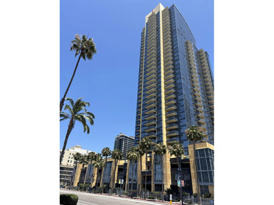Perched high on the 27th floor, this rare end unit residence at - photo 41