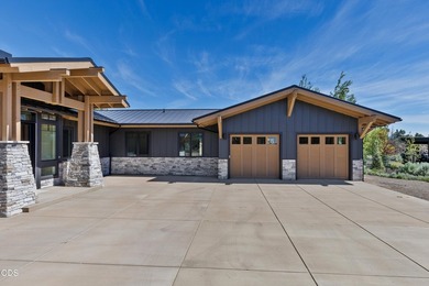 Welcome to this bespoke Craftsman-style villa, nestled in the - photo 7