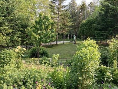Beautifully sited house on 2.3 acres of fruit trees and gardens - photo 34