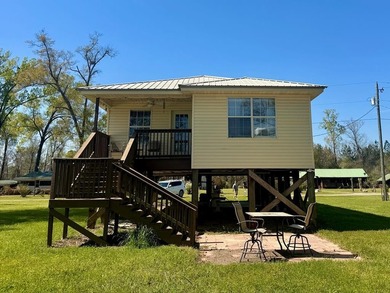 Welcome to your own slice of riverfront paradise in the - photo 2