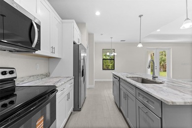 BRAND NEW AND READY 3/2 + DEN! X FLOOD ZONE! This meticulously - photo 12