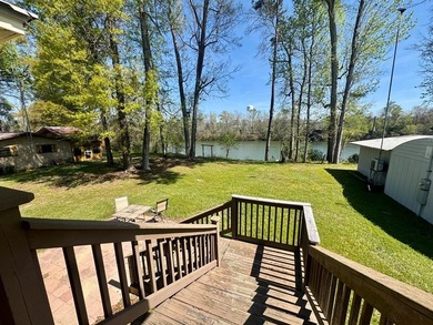 Welcome to your own slice of riverfront paradise in the - photo 3
