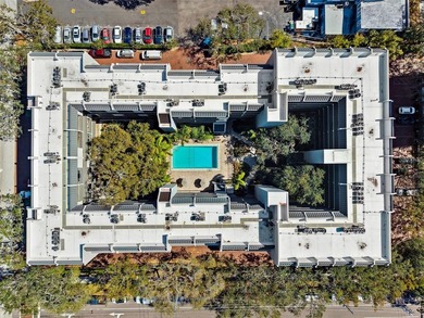 Located just one block from Beach Drive, this urban oasis is - photo 2