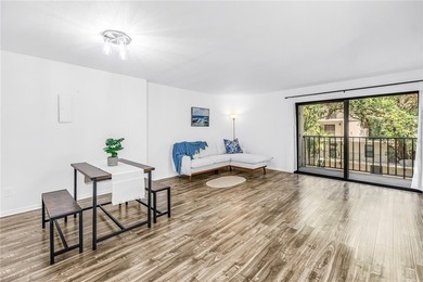 Located just one block from Beach Drive, this urban oasis is - photo 3