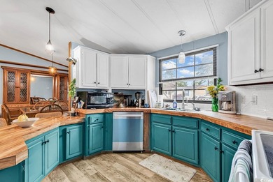 Coastal Charm Meets Recent Updates! This coastal retreat has - photo 9