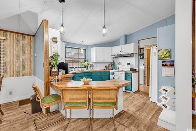 Coastal Charm Meets Recent Updates! This coastal retreat has - photo 10