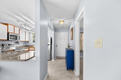 Rare opportunity to own a first-floor end-unit condo in a prime - photo 10