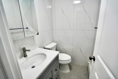 Welcome to 4658 161st Street, a fully renovated 3 family - photo 11