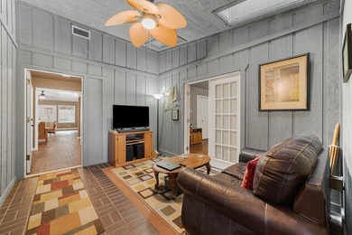 Step into a home designed for both lively entertaining and