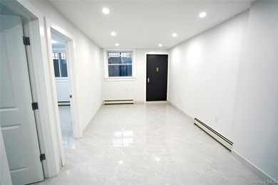 Welcome to 4658 161st Street, a fully renovated 3 family - photo 30