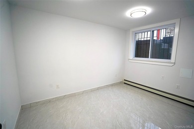 Welcome to 4658 161st Street, a fully renovated 3 family - photo 32