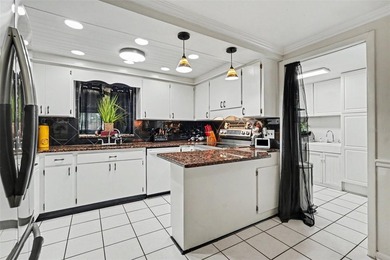 Welcome to this inviting 3-bedroom, 2-bath home in the heart of - photo 13