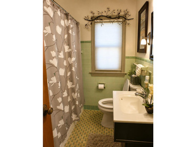Nestled on the beautiful Eris St, in one of Racine's most - photo 21