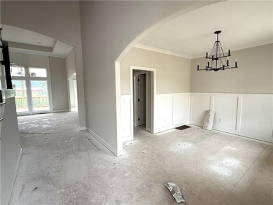 BACKING TO GREEN SPACE WITH LAKE VIEW. Approximately 60 days to - photo 3