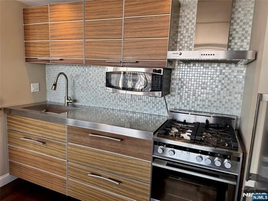 Experience truly exceptional living in this beautifully - photo 10