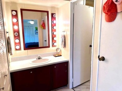 This beautifully maintained turnkey furnished home is situated - photo 12