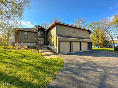 ARCHITECTURAL SHOWPIECE WITH 143' OF LAKE GEORGE FRONTAGE - photo 2