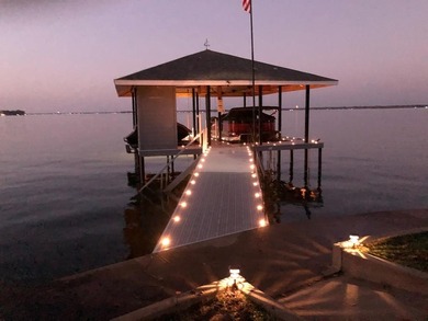 This extraordinary lakefront retreat is a true architectural gem