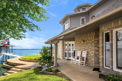 This extraordinary lakefront retreat is a true architectural gem