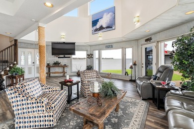 This extraordinary lakefront retreat is a true architectural gem