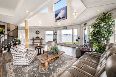 This extraordinary lakefront retreat is a true architectural gem