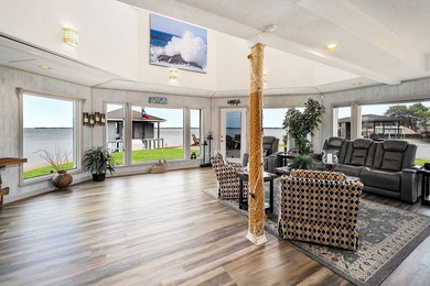 This extraordinary lakefront retreat is a true architectural gem