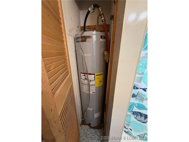 Cute as a button! This cozy cabin is perfectly positioned on a