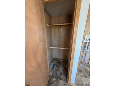 Cute as a button! This cozy cabin is perfectly positioned on a