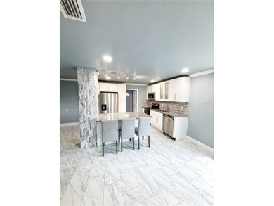 Experience modern luxury in this stunning, fully renovated - photo 17