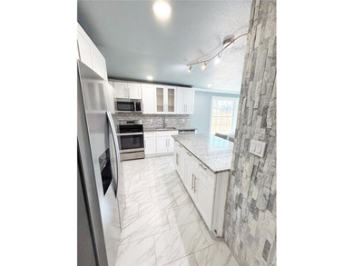 Experience modern luxury in this stunning, fully renovated - photo 26