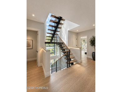 Step inside this modern Mediterranean-inspired residence where - photo 5