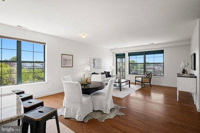 Wonderful and open oversized one bedroom corner unit in the - photo 3