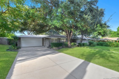 Step through the Terrazzo tile entry and discover a home where