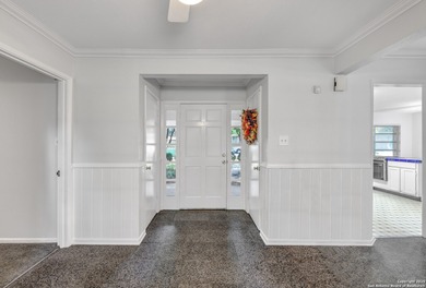 Step through the Terrazzo tile entry and discover a home where