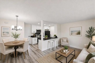 Welcome to this charming and move-in ready condo located in the - photo 1