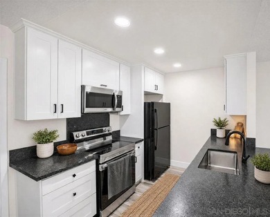 Welcome to this charming and move-in ready condo located in the - photo 2