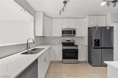 Updated ground level canal front condo at Admiralty Yacht & - photo 8