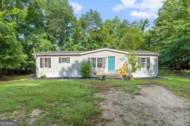 CUTE CUTE CUTE! THIS COMPLETELY REMODELED/UPDATED HOME IS READY - Lake Home For Sale in Eatonton, Georgia