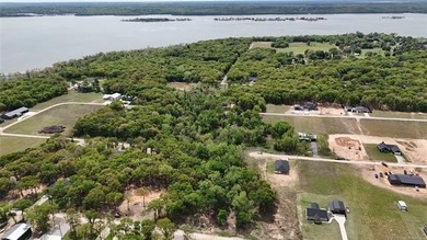 At the end of a peaceful cul-de-sac, this 1.11-acre wooded lot - photo 2