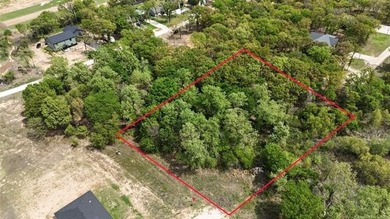 At the end of a peaceful cul-de-sac, this 1.11-acre wooded lot - photo 7