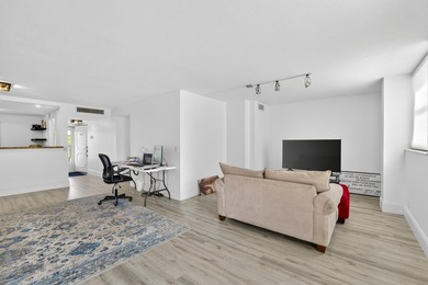 Discover this 2-bedroom, 2-bathroom condominium in the - photo 13