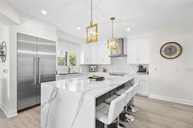 Welcome to the epitome of waterfront living in Ocean Ridge, just - photo 16