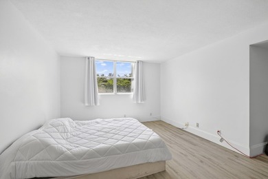 Discover this 2-bedroom, 2-bathroom condominium in the - photo 19